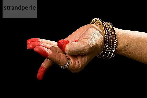 Woman hand showing Chatura hasta (meaning Square) of indian classic dance Bharata Natyam