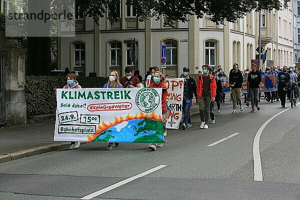 Protestors with banner at Fridays for Future event in Coburg  Germany  as part of the worldwide climate strike. Coburg