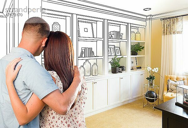 Young military couple facing custom built-in shelves and cabinets design drawing gradating to finished photo