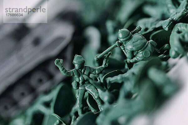 Close-up of green plastic toy soldiers
