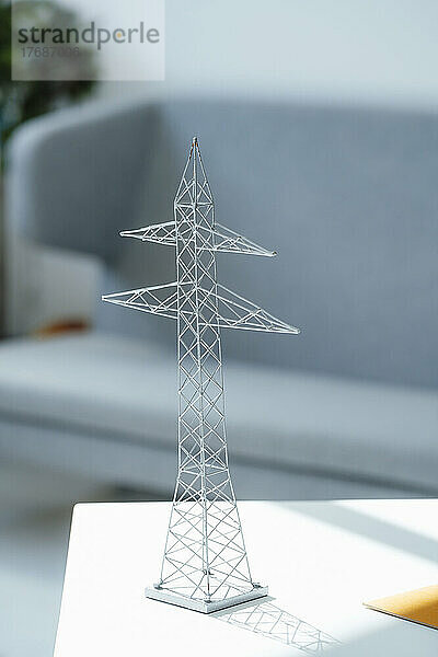 Electricity pylon model on table at office