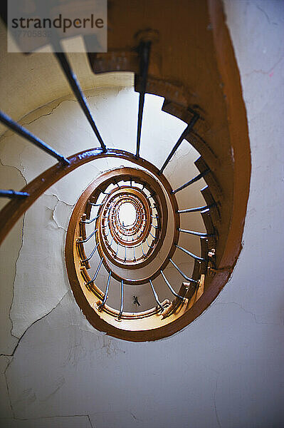 Low Angle View Of A Curved Railing On A Winding Staircase  Marais District; Paris  Frankreich