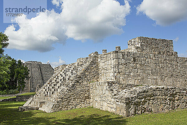 Turtle Temple in the foreground  Kukulcan Temple (Castillo) in the background  Mayan Ruins  Mayapan Archaeological Zone  Yucatan State  Mexico  North America