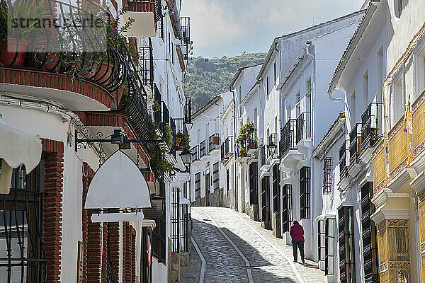 Out for a stroll in Zahara de la Sierra  one of the whitewashed towns of Andalusia  Spain  Europe