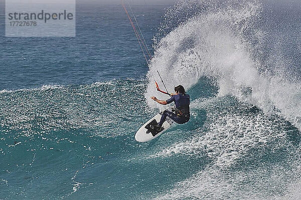 Kite-surfing on Atlantic rollers at Ponta Preta  southwest coast of Sal  Cape Verde Islands  Atlantic  Africa