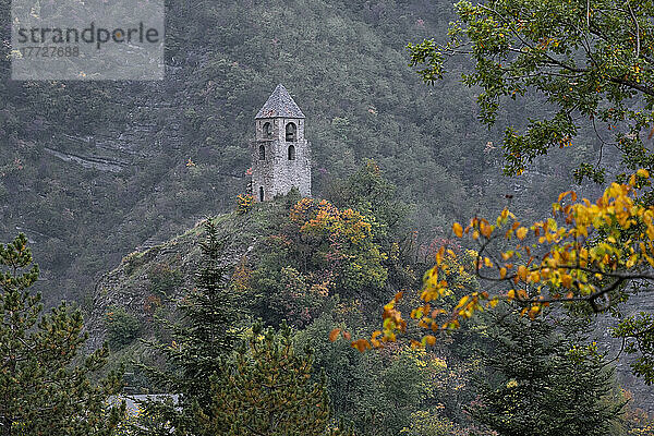The ancient medieval tower of Rocca Corneta on the top of a hill in autumn  Emilia Romagna  Italy  Europe