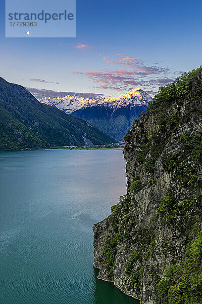 Monte Legnone at sunrise from elevated viewpoint above Lago di Novate  Valchiavenna  Valtellina  Lombardy  Italy  Europe