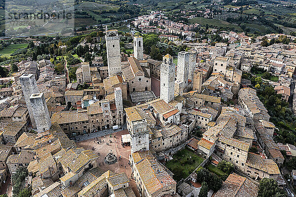 Italy  Tuscany  San Gimignano  Helicopter view of historic town in summer