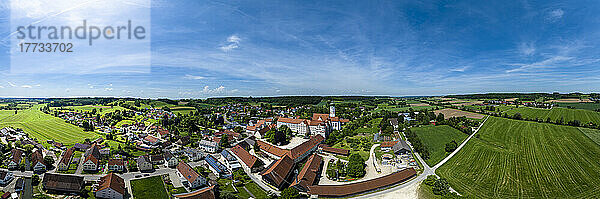 Germany  Bavaria  Kammeltal  Helicopter panorama of rural town in summer with Wettenhausen Abbey in center
