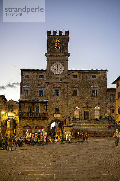 Italy  Province of Arezzo  Cortona  Piazza della Repubblica and medieval town hall at dusk
