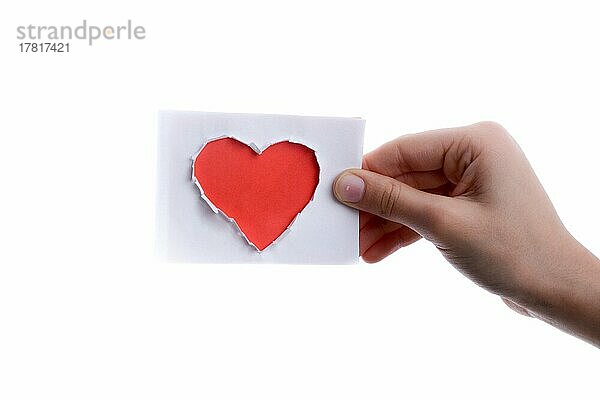 Hand hält ein rotes Herz Form Papier aus Papier auf einem weißen Hintergrund ausgeschnitten