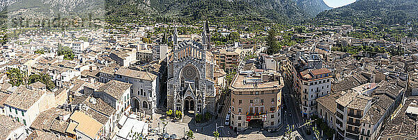 Spain  Balearic Islands  Soller  Helicopter panorama of Church of Saint Bartholomew and surrounding houses in summer