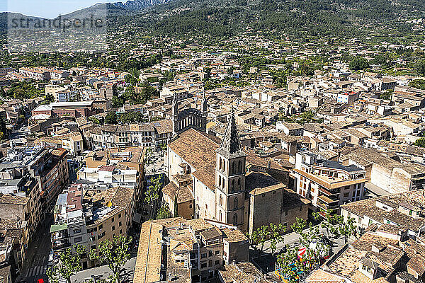 Spain  Balearic Islands  Soller  Helicopter view of Church of Saint Bartholomew and surrounding houses in summer