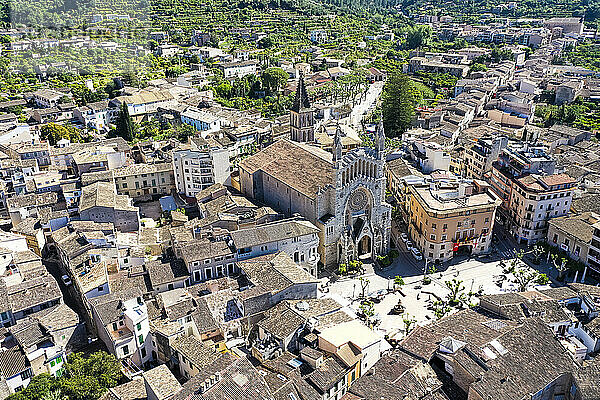 Spain  Balearic Islands  Soller  Helicopter view of Church of Saint Bartholomew and surrounding houses in summer