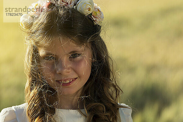 Smiling girl wearing flower crown