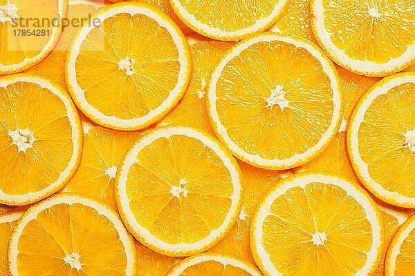 Bunte Orange Zitrusfruchtscheiben Hintergrund Ansicht von oben