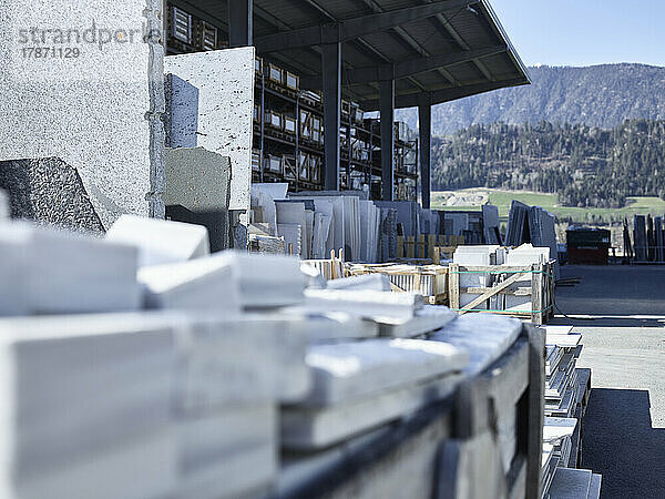 Natural stone slabs stacked at industry