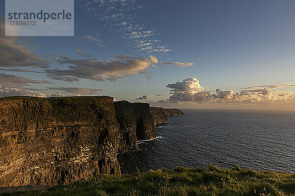 Cliffs of Moher by sea at sunset  Ireland