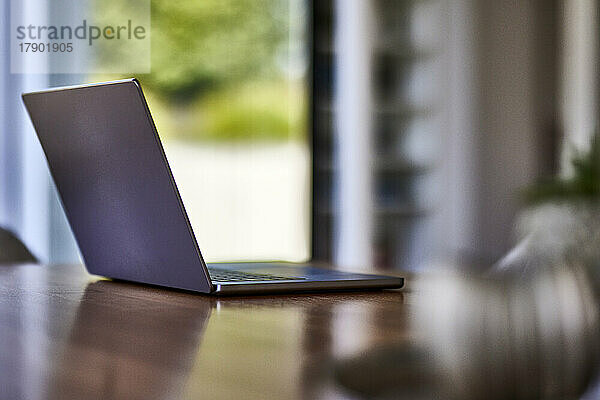 Laptop on table at home