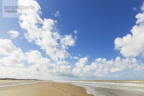 Belgium  West Flanders  De Haan  Clouds over sandy beach