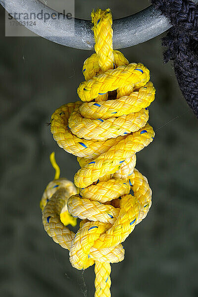 Complex knot on yellow rope