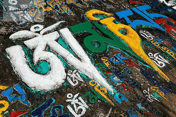 Buddhist mantra Om mani padme hum written many times stone. Kora around Tsuglagkhang complex. McLeod Ganj  Himachal Pradesh  India