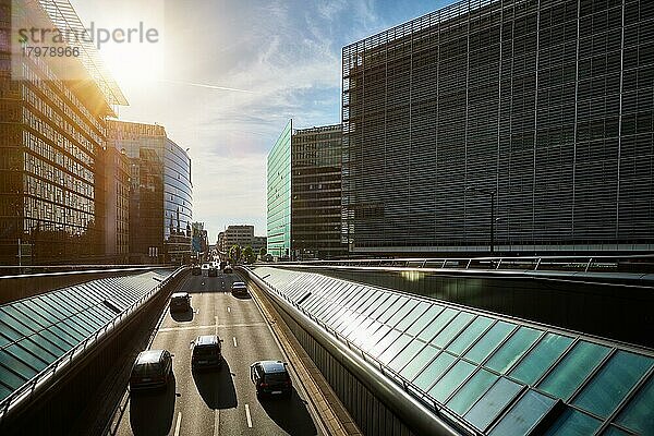 Street traffic in Brussels near European Commission building on sunset Rü de la Loi  Bruxelles  Belgium