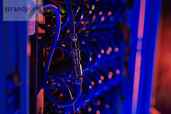 Computer cables attached together in server room