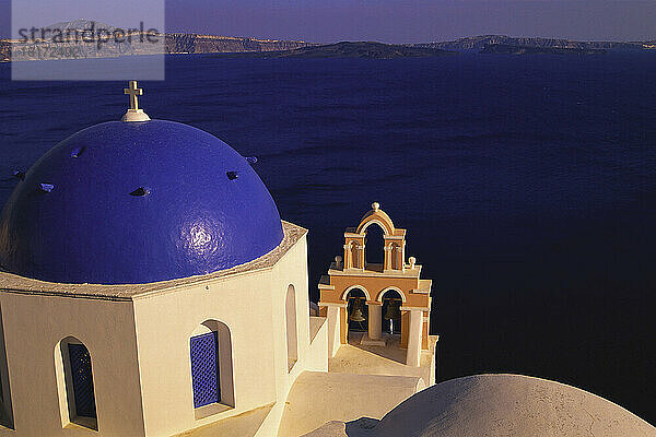 Blue Domed Church and Ocean  Oia  Santorini  Greece