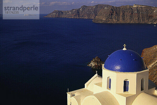 Blue Domed Church and Ocean  Oia  Santorini  Greece