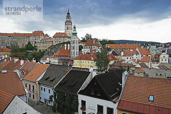 Overview of rooftops with St Jost Church tower and Cesky Krumlov Castle tower  Cesky Krumlov  Czech Republic.