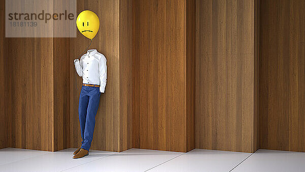 Dreidimensionale Darstellung einer unsichtbaren Person  die einen Ballon mit traurigem Gesicht hält