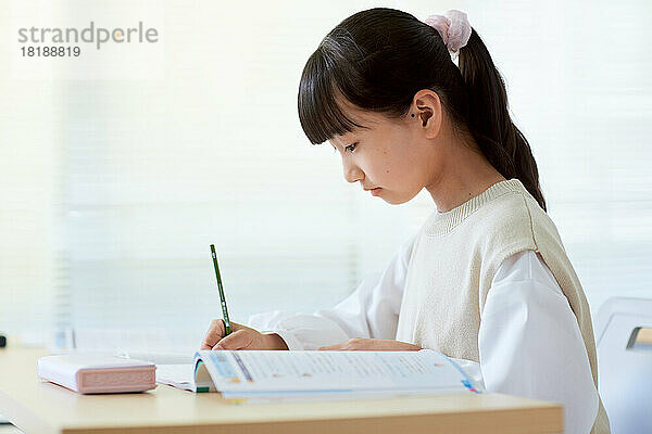 Japanese kid studying