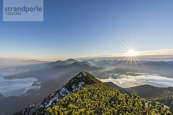 Germany  Bavaria  Sunrise over summit of Herzogstand mountain