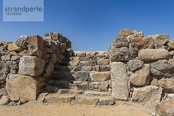 Rocky staircase under blue sky at Al-Ukhdud Archaeological Site in Najran  Saudi Arabia