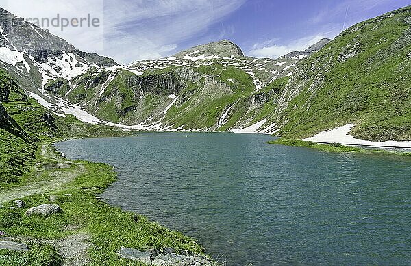 Naßfeldspeicher mit Schneeresten  Großglockner Hochalpenstraße  Heiligenblut  Kärnten