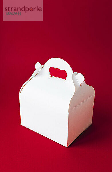 Take away box against red background