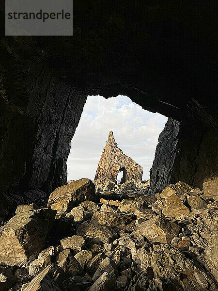 Rock formation seen through natural arch