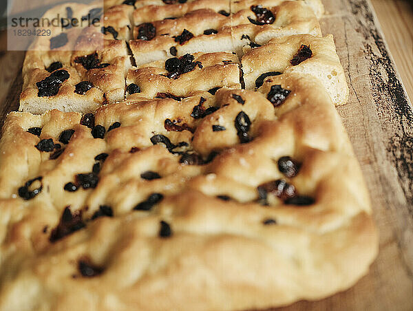 Homemade focaccia on kitchen table