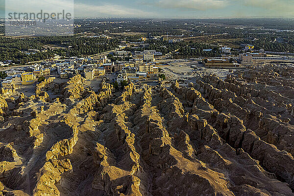 Saudi Arabia  Eastern Province  Al-Hofuf  Aerial view of Jabal Al-Qarah with city in background