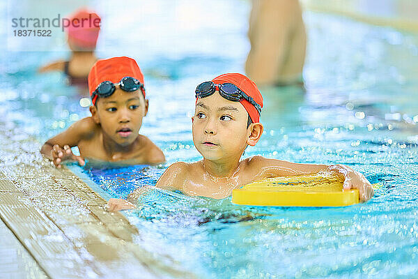 Kids at indoor swimming pool