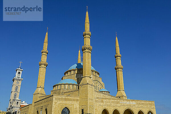 Glockenturm der maronitischen St.-Georgs-Kathedrale und sunnitische Mohammed al-Amine-Moschee  Beirut  Libanon  Naher Osten