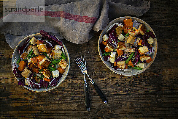 Two bowls of ready-to-eat vegan salad