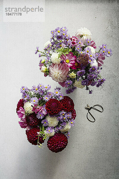 Studio shot of two bouquets of seasonal flowers