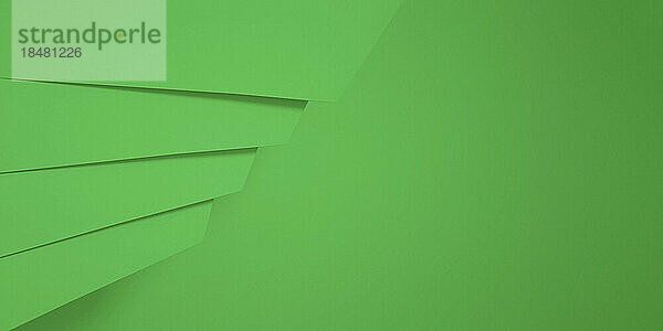 Geometric shapes on abstract green background