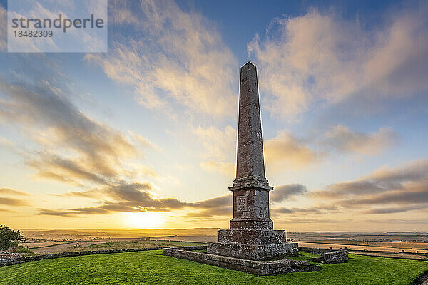 Balfour Monument in front of sky at sunset  East Linton  Scotland