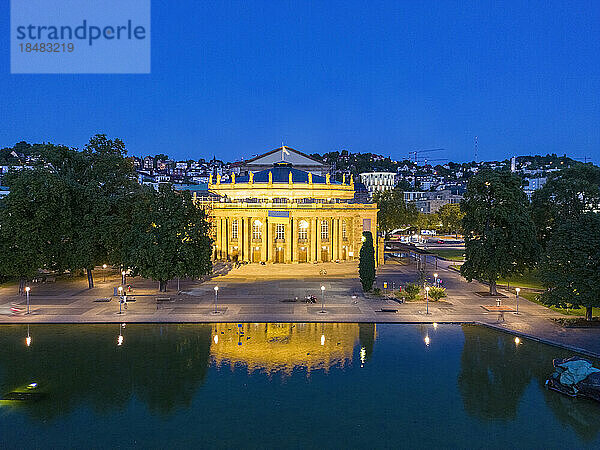Reflection of Stuttgart State Theatre reflecting in water at night  Stuttgart  Germany