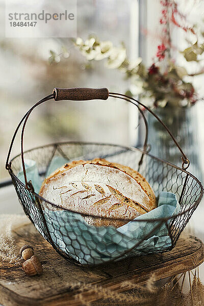 Basket with freshly baked sourdough bread