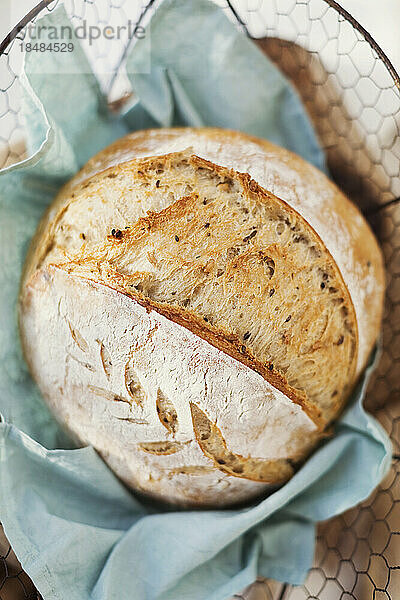 Basket with freshly baked sourdough bread
