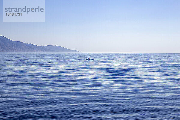 Spain  Balearic Islands  Lone boat in Mediterranean Sea